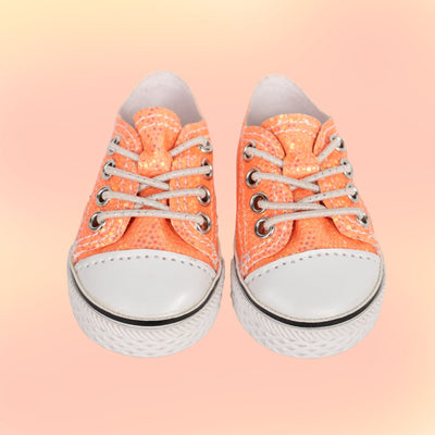 Sparkly peach runners by Maplelea for 18-inch dolls wih stretchy laces.