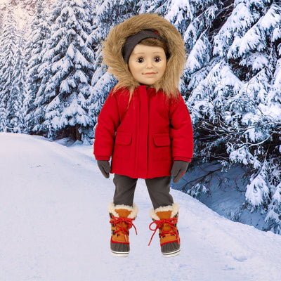 18" boy doll walking in snowy woods wearing red parka with fur trim and snow boots