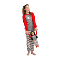 girl wearing red and gray polar bear pajamas with a matching doll.