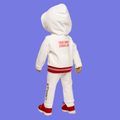 18-inch doll wearing white hoodie and pants set with red Canadian phrases and maple leafs.