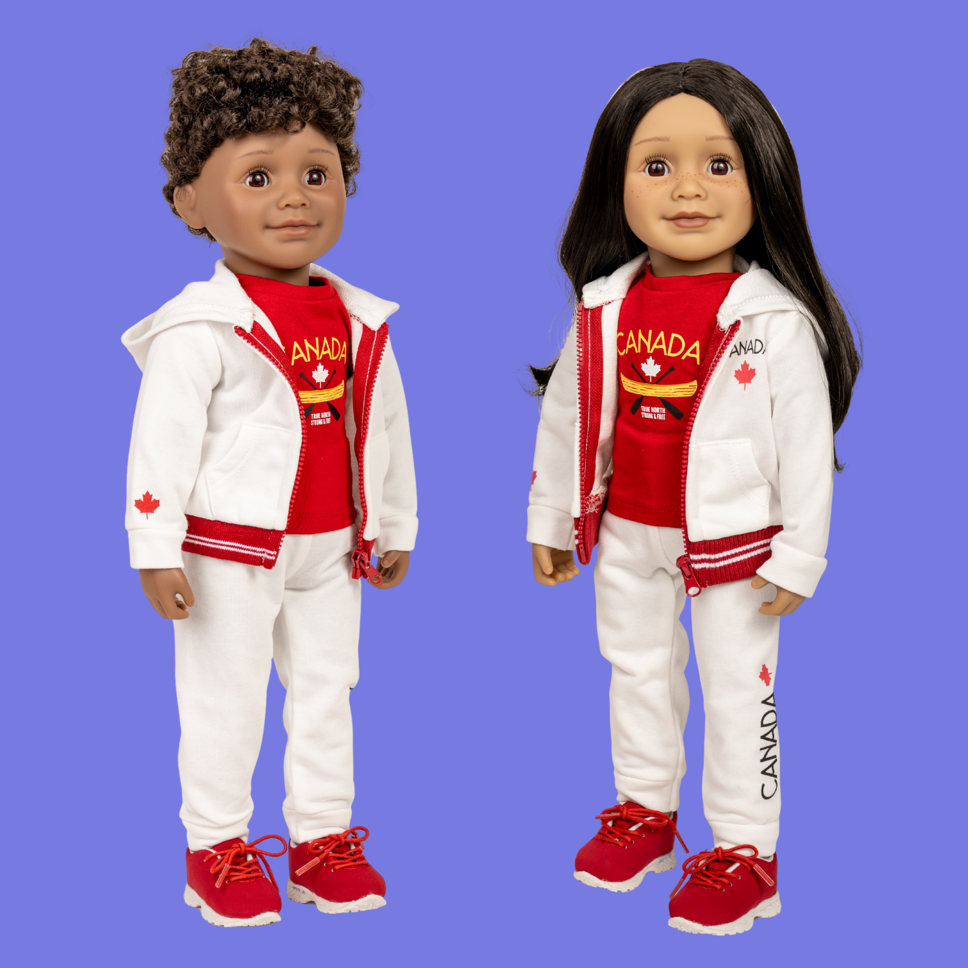 Two 18-inch dolls wearing a red 'Canada' t-shirt with white pants and red shoes.