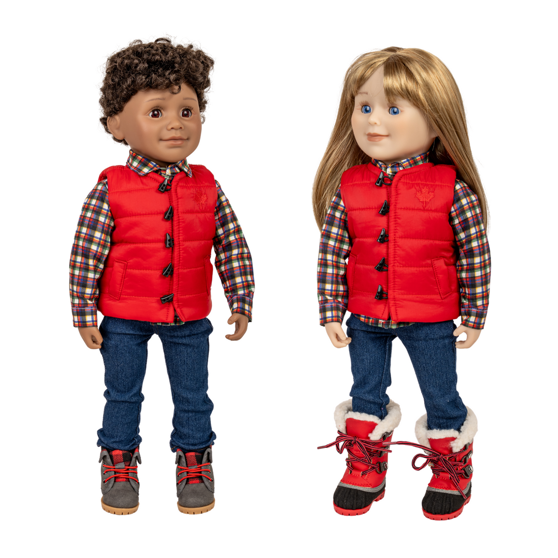 Two 18-inch dolls wearing red puffer vests, plaid shirts, blue jeans, and winter boots .
