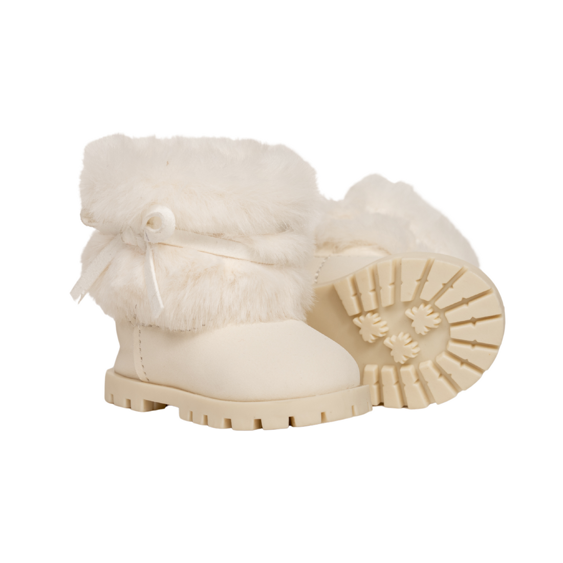 Cream furry boots with a bow for 18-inch dolls.