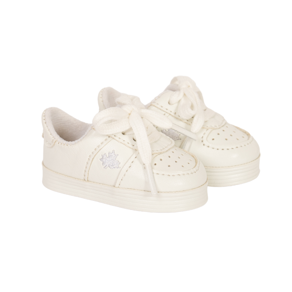 A pair of off-white doll sneakers with matching laces, featuring a textured toe cap, perforated details, and a small embroidered logo on the side, set against a plain white background.