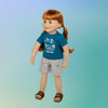 18" Jenna girl Maplelea doll wearing a graphic t-shirt shorts and brown buckle sandals