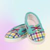 Boat style shoes with plaid detail and pink elastic laces fit all 18" dolls like Maplelea