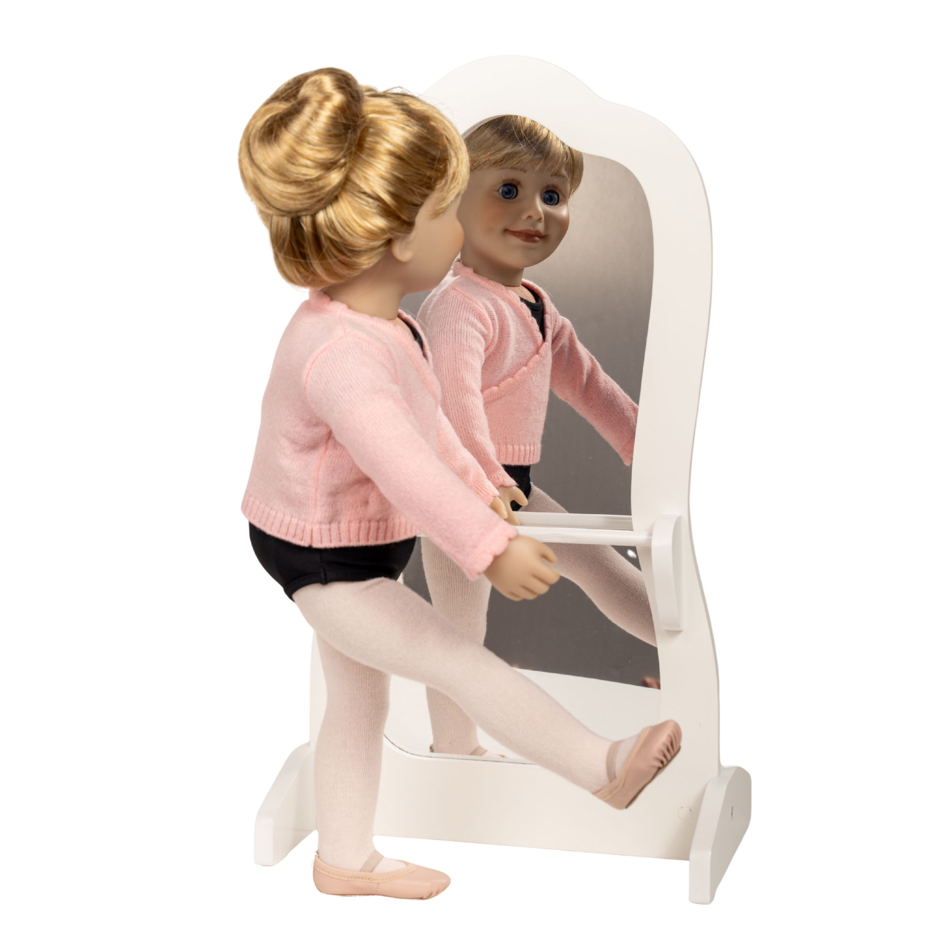 18-inch doll wearing a pink ballet outfit with pink tights and black bodysuit next to ballet mirror.