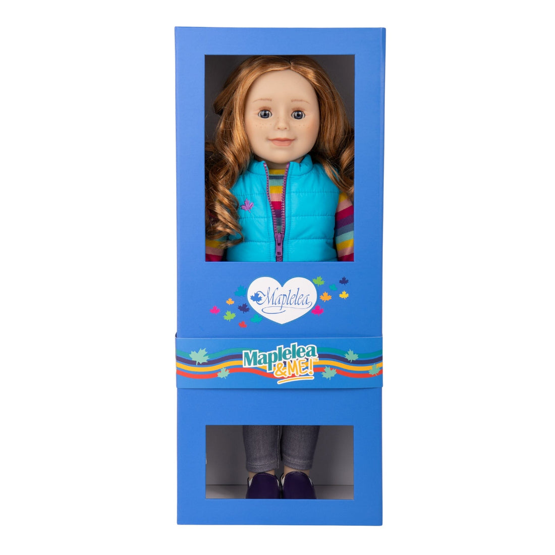 Doll wearing an 'Happy Camper' shirt and purple shorts.