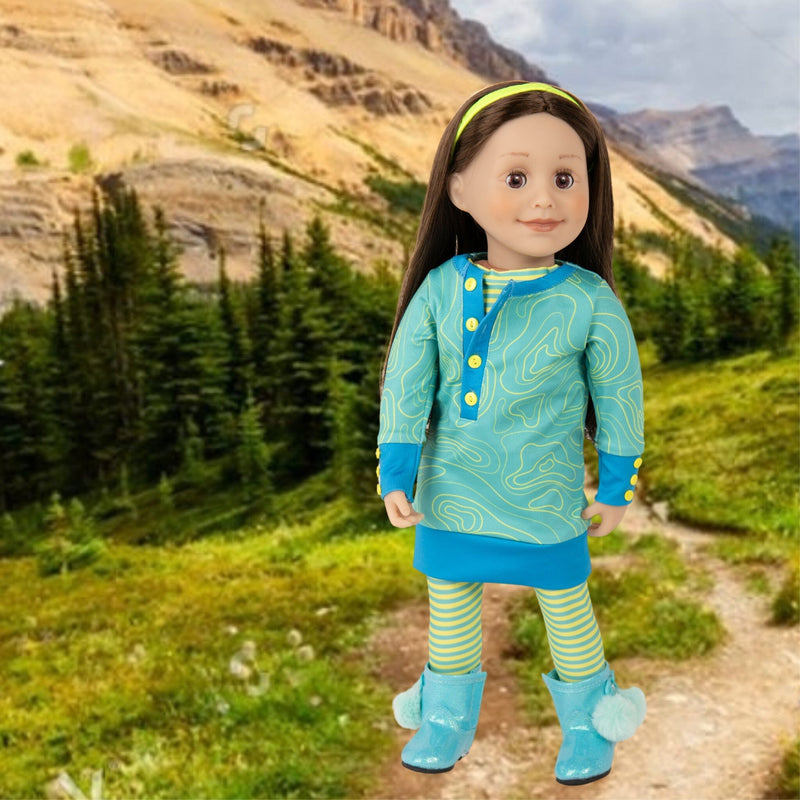 18" Maplelea Canadian girl doll wearing aqua dress with striped tights yellow hairband and boots