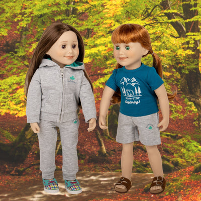 Maplelea dolls in camping hoodie sweatpants and runners and graphic t-shirt and shorts with sandals