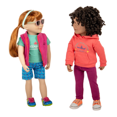 Maplelea 18" dolls wearing colourful summer camp attire with many pieces and wearing runners