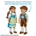 Two German-themed dolls shown on a white background with promotional text reading 'Complete your German celebrations with the Edelweiss Lederhosen Set!' and a note that the set is sold separately. Edelweiss Dirndl Set traditional German outfit for 18-inch dolls by Maplelea Lederhosen boy girl
