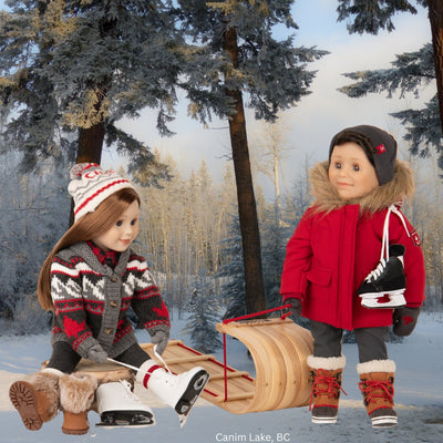 girl doll in bulky knit sweater lacing figure skates, boy doll in a red parka carrying hockey skates