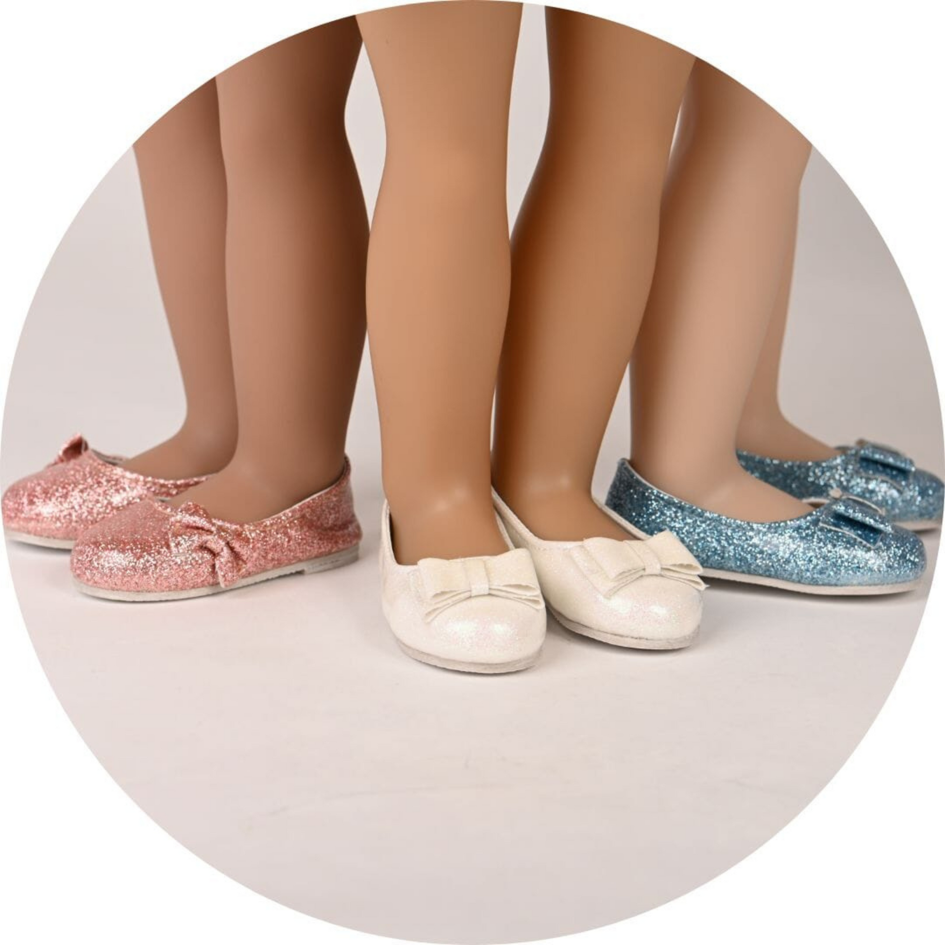 Three pairs 18-inch doll slip-on shoes in pink, white, and blue.