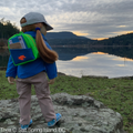 18-inch doll jenna standing outside looking at the water