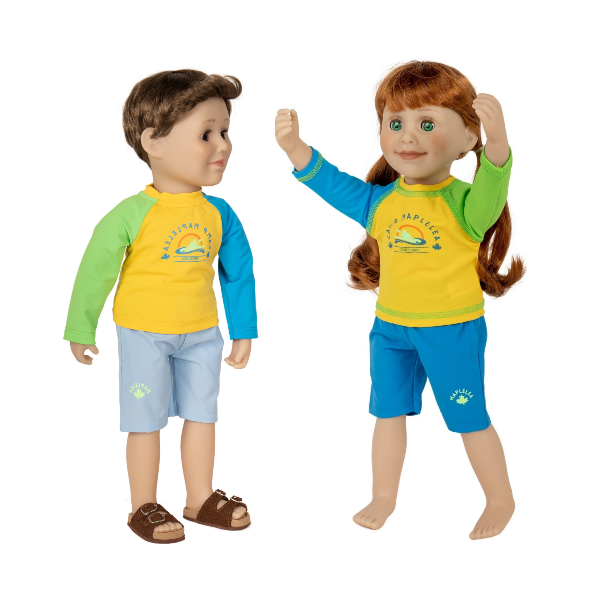 boy and girl 18-inch dolls wearing the keep on kayaking swim wear set