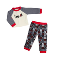 A two-piece doll pajama set featuring a long-sleeve top with gray sleeves, a cream body, red trim, and a bear/trees graphic, paired with matching patterned pants in gray, red, black, and white.