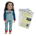 Doll wearing pajamas with a nature design and journal pages 'The Busy Spruce Tree' on a white background.