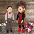 girl doll and boy doll wearing rural roots buffalo plaid outfits dress and suspenders.