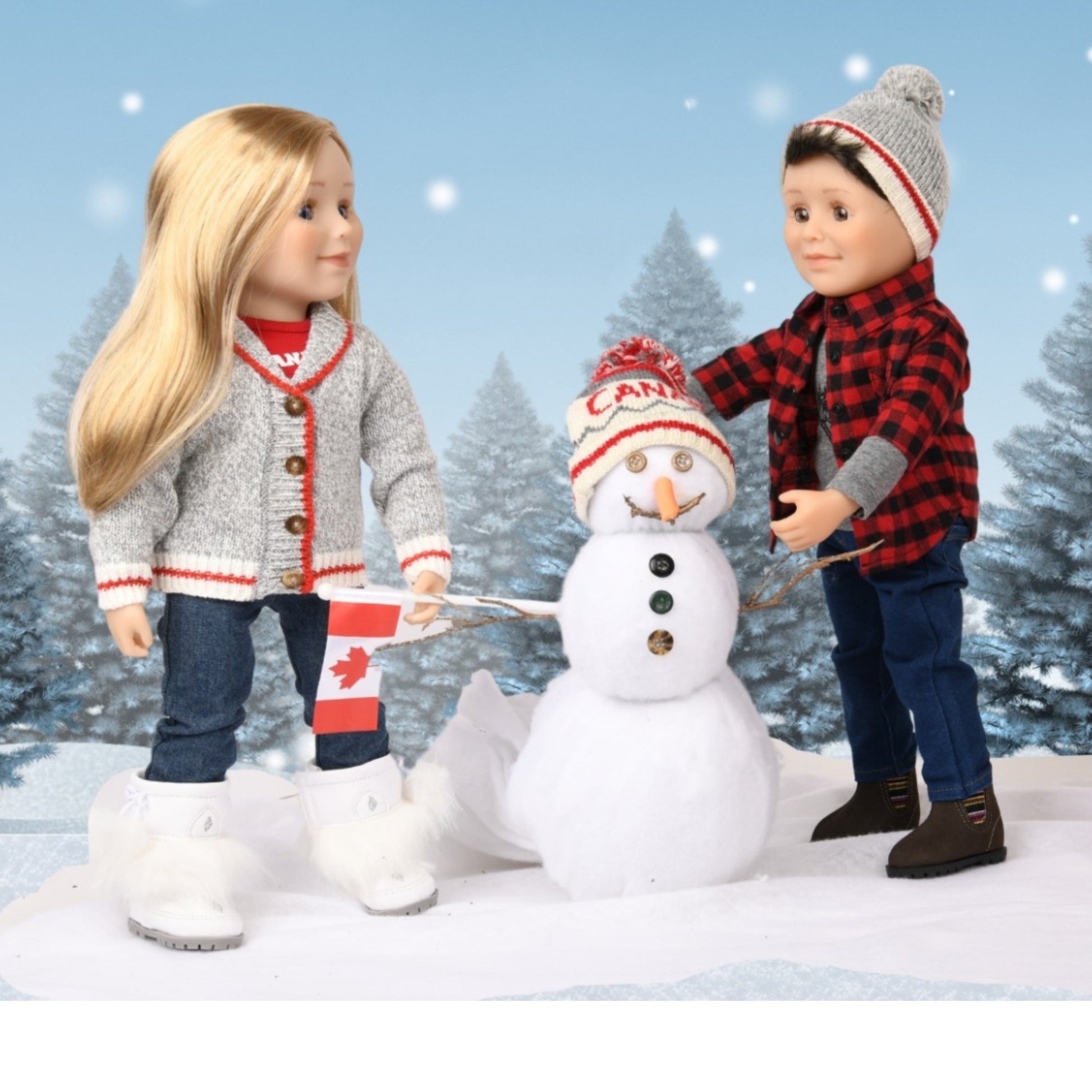 girl doll and boy doll wearing Canadian outfits in the snow