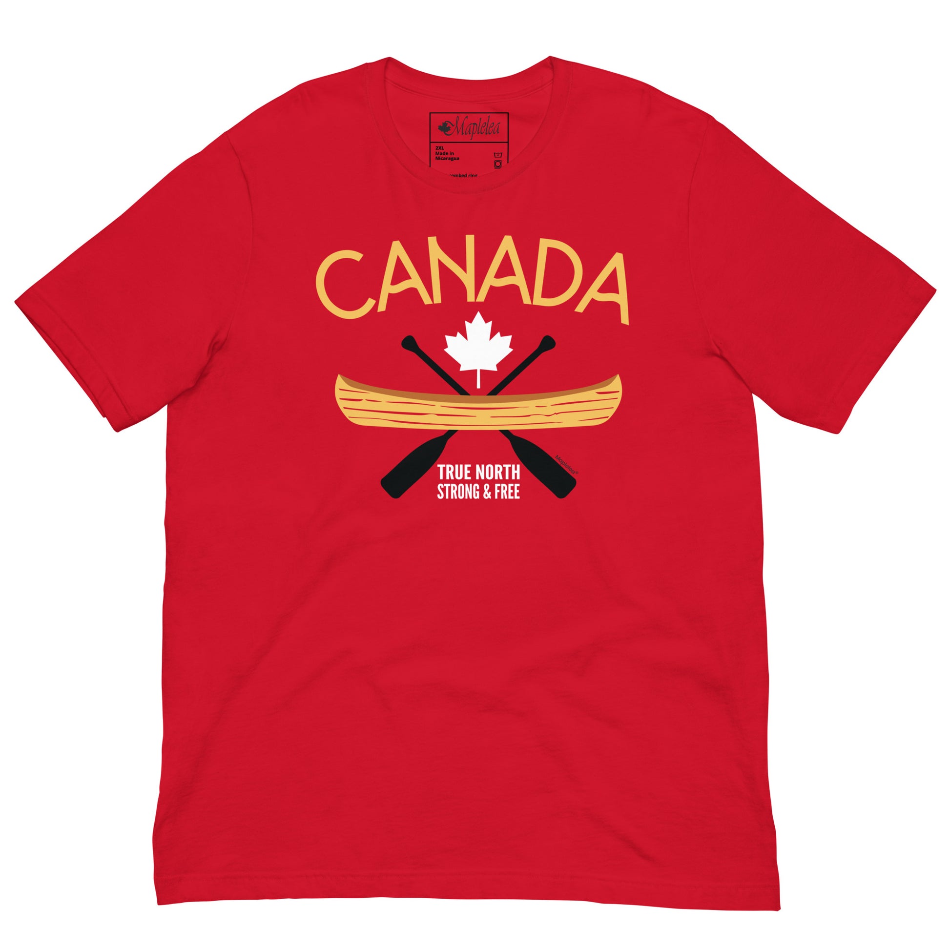 Front view of a red adult plus size T-shirt displayed on a light grey background. The shirt features a Canada-themed graphic with the word “CANADA” in gold above a white maple leaf, a gold canoe, and crossed black paddles. Below the design are the words “TRUE NORTH STRONG & FREE” in white. The shirt has short sleeves and a crew neckline.