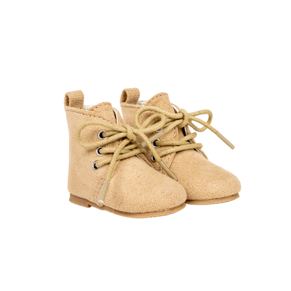 Pair of beige boots with suede-like fabric, and metal grommets with real tie up laces for 18-inch dolls.