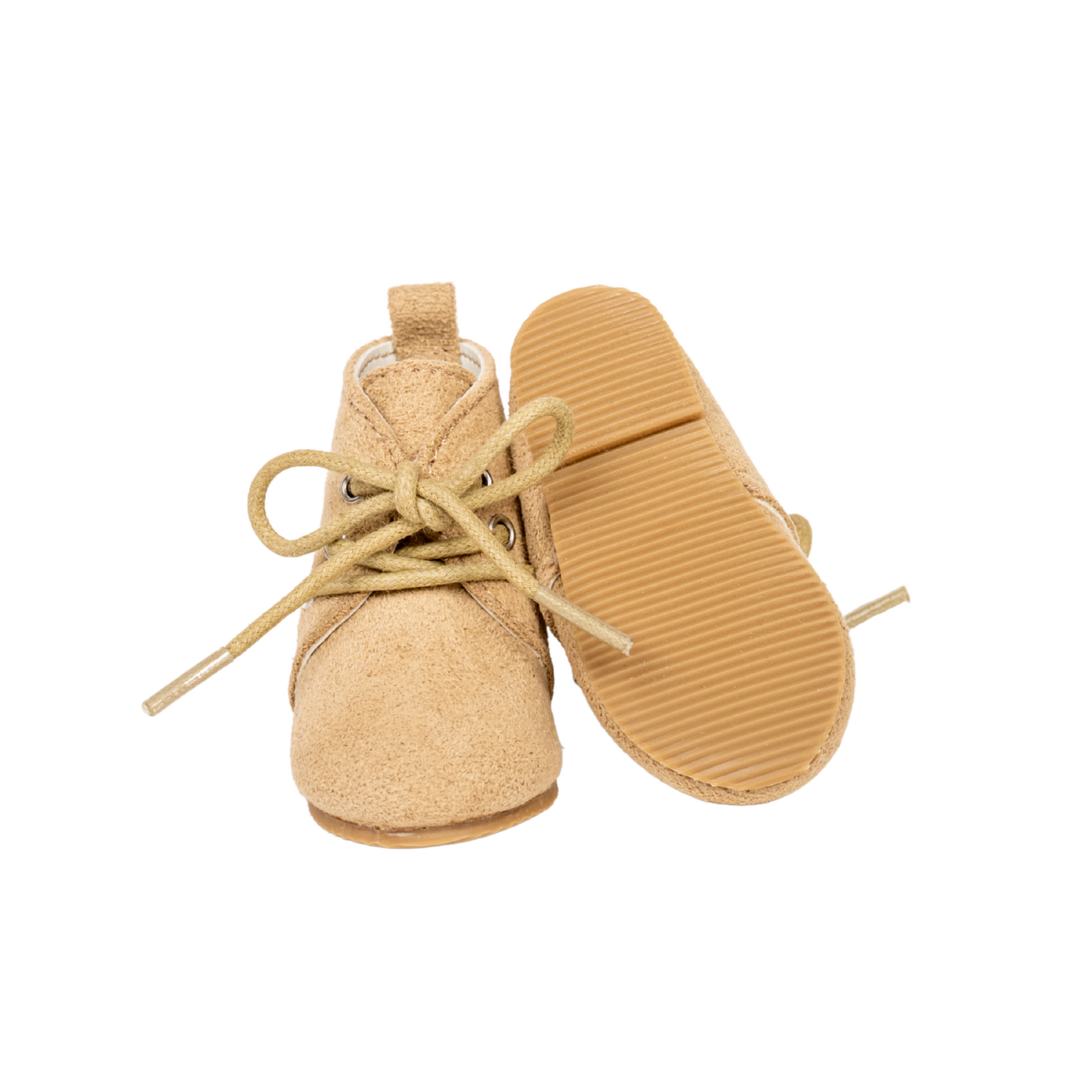 Pair of beige boots with suede-like fabric, and metal grommets with real tie up laces for 18-inch dolls.