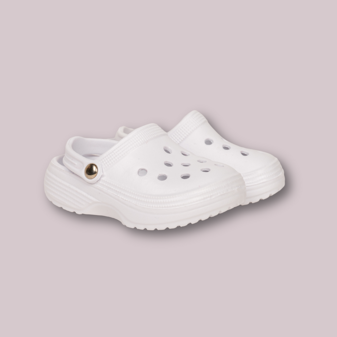 Maplelea white foam clogs for 18-inch dolls with ventilation holes and ankle strap for security.