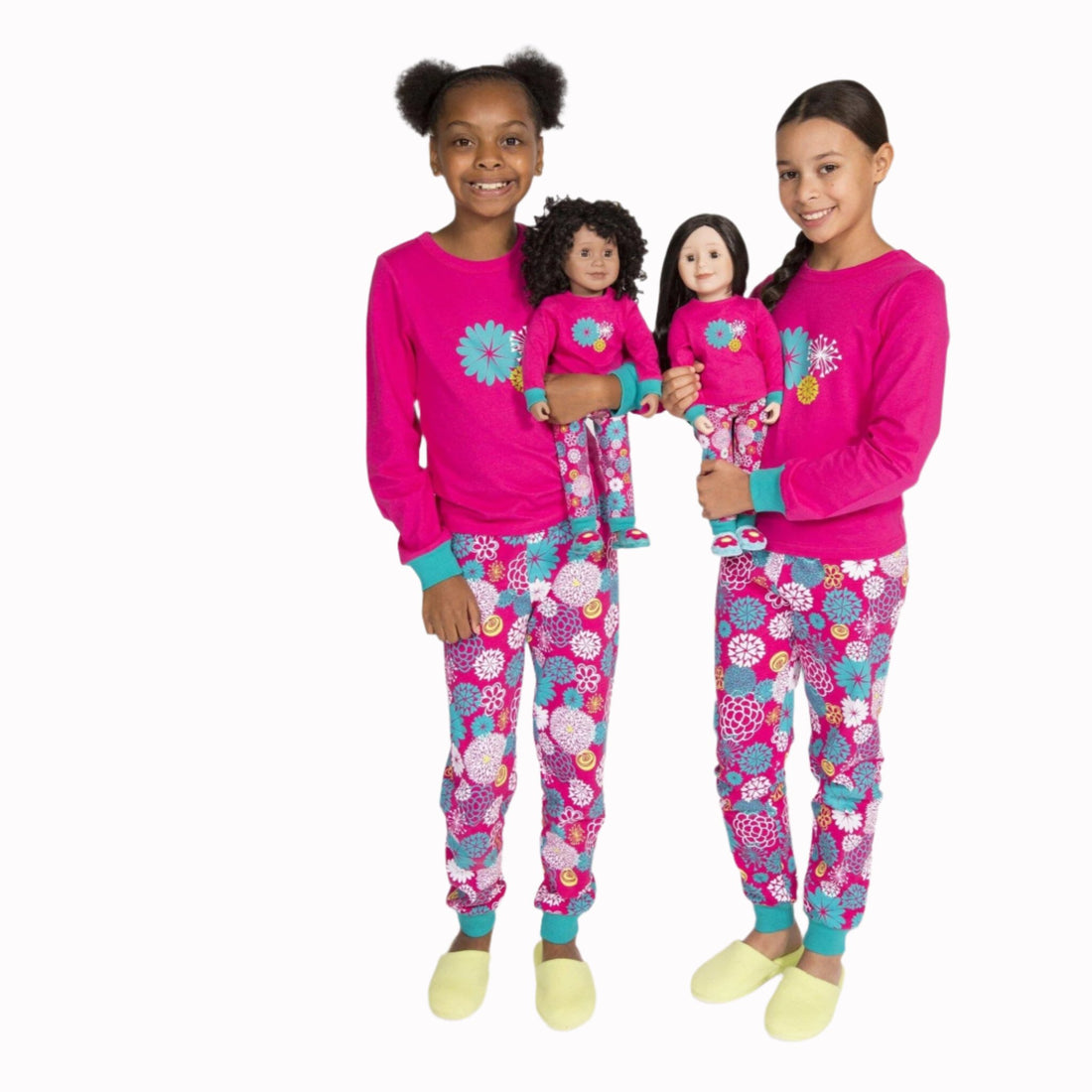 Matching pajamas for doll and girl.  Pink and teal PJs shown on 18 inch doll.