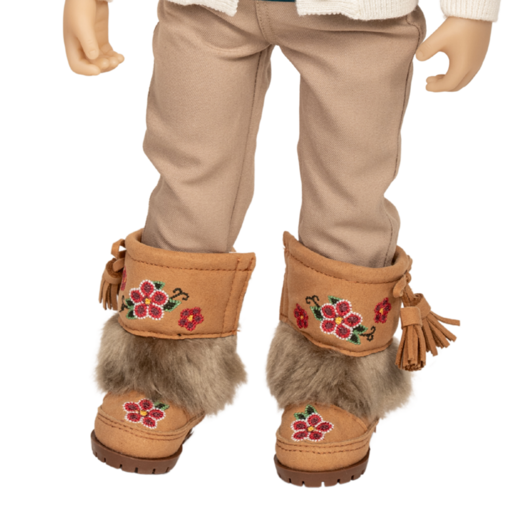 18-inch doll wearing Maplelea's moccasin boots with embroidered beadwork design, tassels, and faux fur lining.