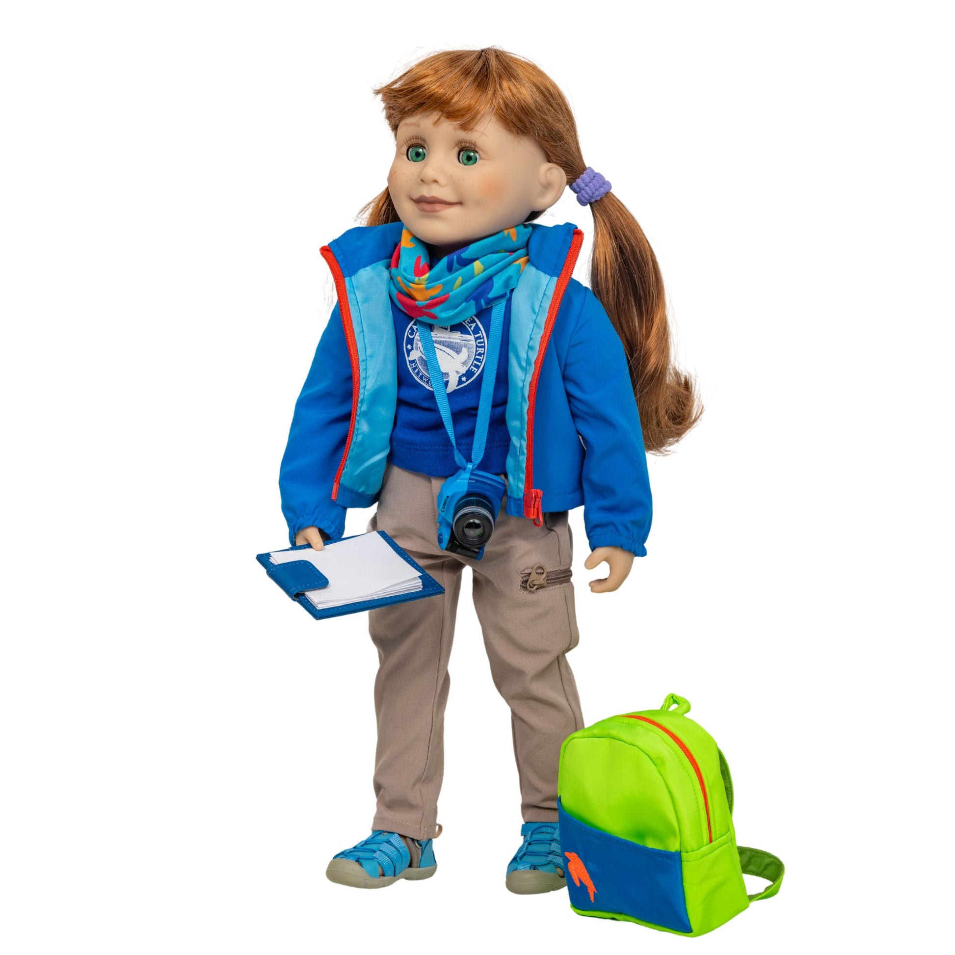 maplelea doll dressed in sea turtle expedition set with clip board, camera and backpack.