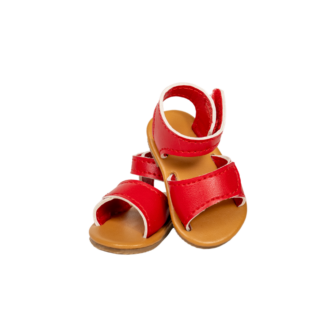 Maplelea red strappy sandals with brown soles and ankle strap for 18-inch dolls.