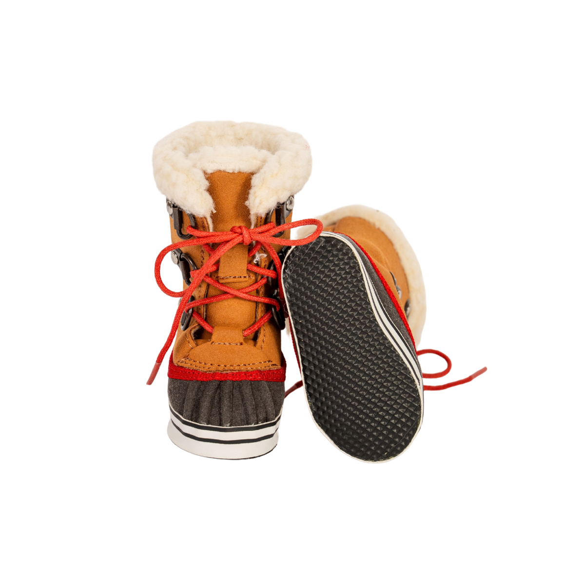 A pair of 18 inch doll winter boots in mustard yellow and brown, featuring a white faux-fur collar, bright red laces, and a black textured outsole, shown against a plain white background doll shoes