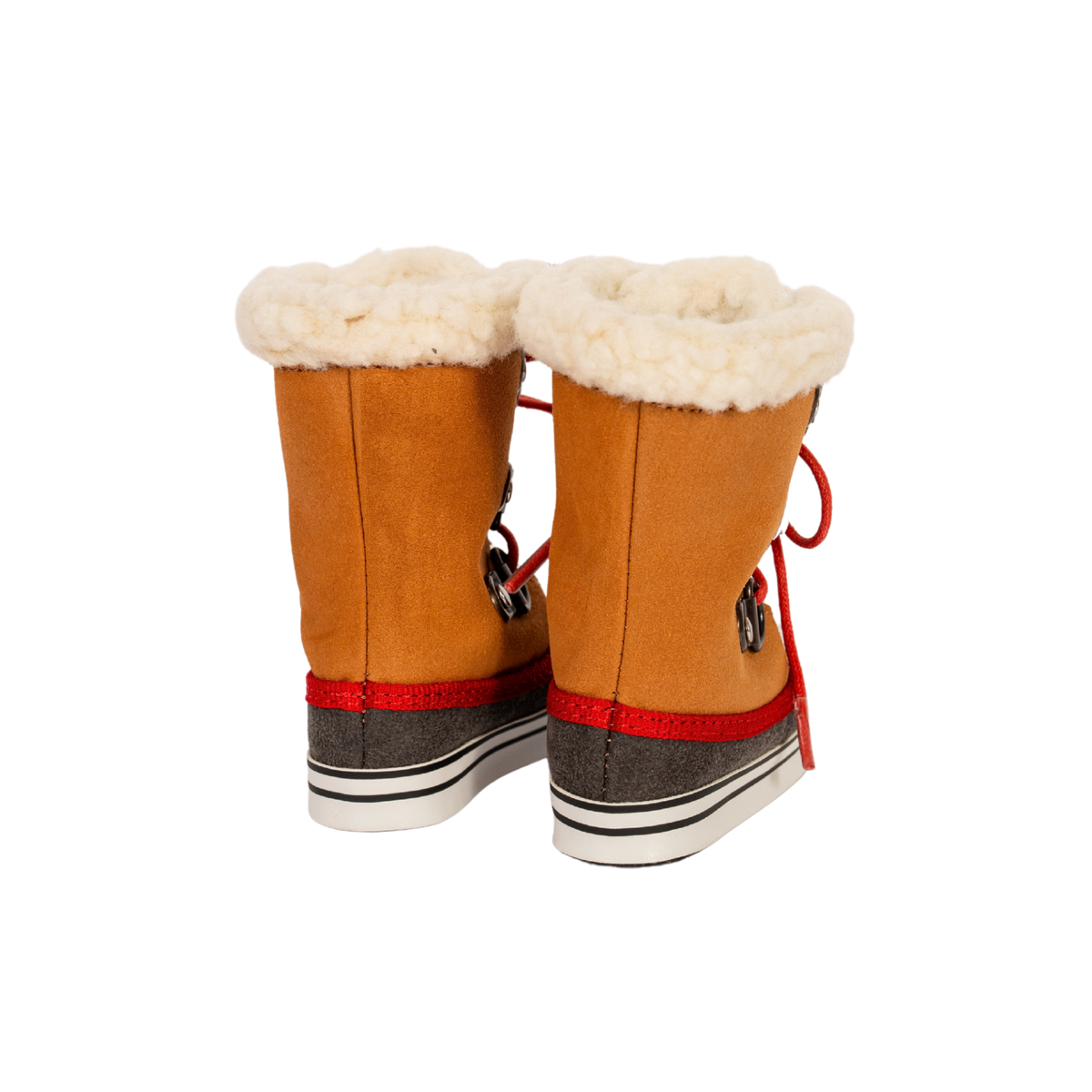 A pair of 18 inch doll ankle winter boots in tan suede with a cream shearling lining, featuring red laces, a red stripe, and a dark gray heel counter with a white and black sole. Maplelea and fits american girl dolls