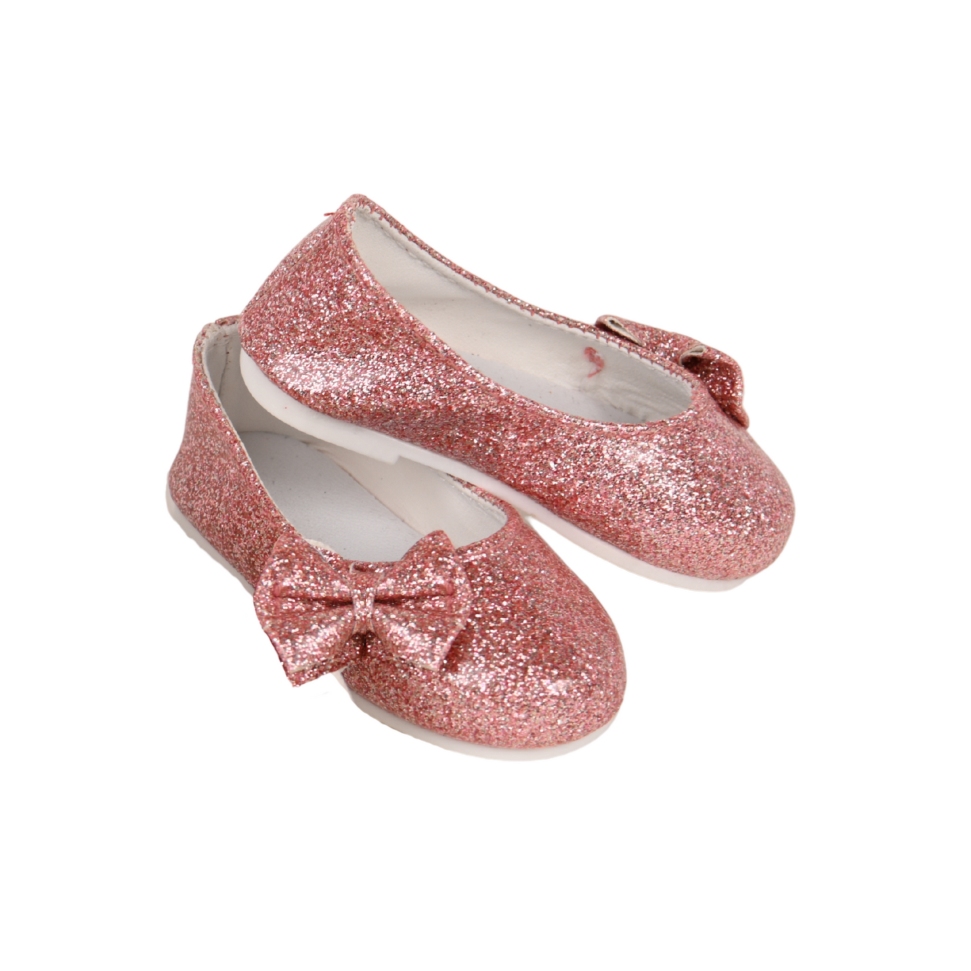 Pair of glittery pink shoes with a bow .