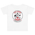White baby T-shirt displayed on a light gray background, featuring a circular “True North Canada” graphic in red and black. The design includes crossed hockey sticks, a maple leaf, evergreen trees, a moose, and an Inukshuk, with the words “True North,” “Canada,” and “Strong & Free” arranged around the emblem.