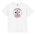 White youth T-shirt displayed on a light gray background, featuring a circular “True North Canada” graphic in red and black. The design includes crossed hockey sticks, a maple leaf, evergreen trees, a moose, and an Inukshuk, with the words “True North,” “Canada,” and “Strong & Free” arranged around the emblem.
