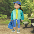 18-inch doll in windbreaker, t-shirt, capris, drawstring backpack, hat, and shoes.