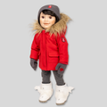 Doll wearing a red coat with fur hood, gray pants, white boots, and gray gloves.