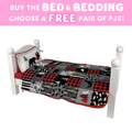 Doll bed with checkered bedding and free pjs offer on pink background