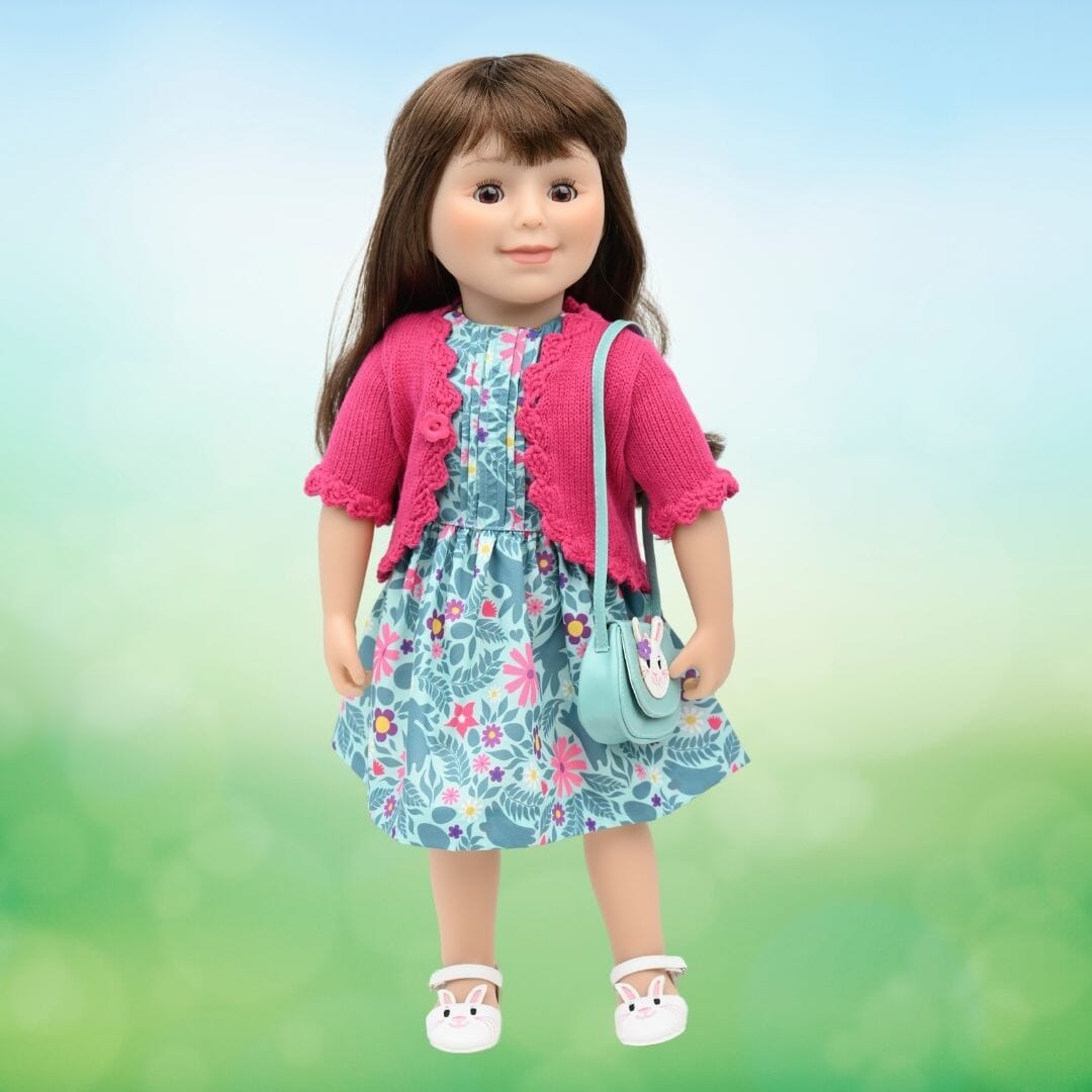 18-inch doll wearing Easter dress with bunny shoes and bunny purse