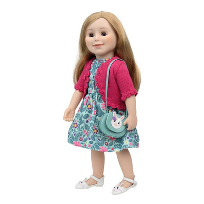 doll wearing a cute Easter dress, shoes and purse