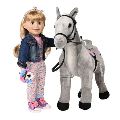 farm girl doll with her welsh pony wears floral overals and jean jacket