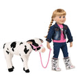 Canadian girl doll leads her calf on the farm