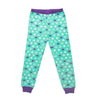 Dream Team sporty matching girl-sized sports-themed teal and purple patterned PJ pants in varying sizes for girls.