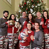 Large family dressed alike in matching pajamas for the holidays