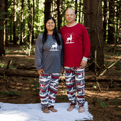 Man and woman wearing matching pajamas from Maplelea