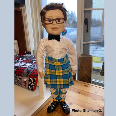 boy doll wearing a kilt and ghillies for highland dancing