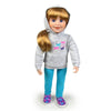 18 inch Canadian Girl doll wearing horse hoodie with colourful slip-on shoes aqua leggings.