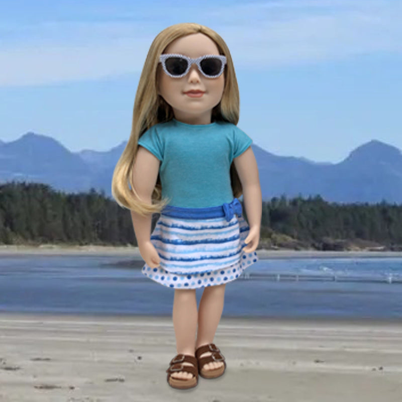 girl doll in cute summer dress with sunglasses